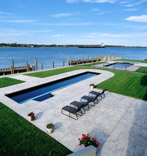 Where Water Meets Texture: Stamped Concrete Poolside Design